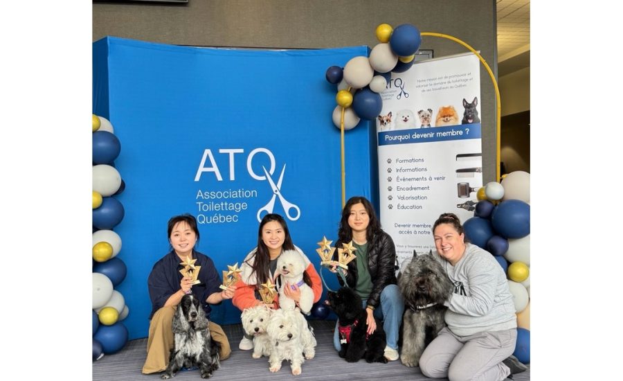 C&D Pet Studio team with dogs and trophies at ATQ 2026 in Victoriaville